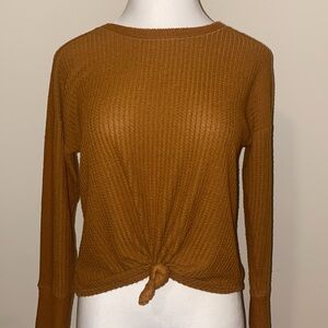 Women’s size Large burnt orange Mudd waffle knit top with long sleeves.
